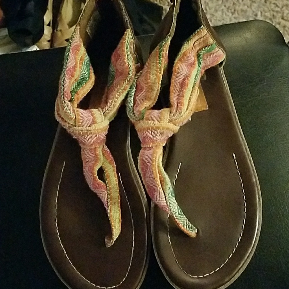 Brightly colored flat sandals with back zipper